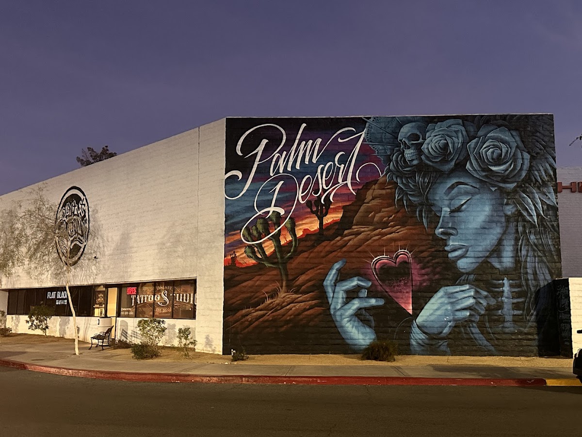 InkFamy Tattoo mural — Día de los Muertos woman with sacred heart, Palm Desert Chicano art